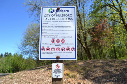 Sign – City of Hillsboro Park Regulations – closed dusk to dawn – dogs on leash – no smoking, fires, alcohol